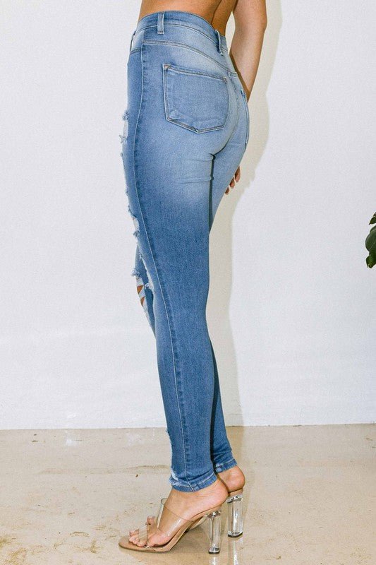 Ariana High - Waisted Distressed Skinny Jeans - Fashionistar boutique